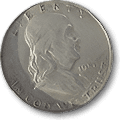 Silver coin with profile engraving