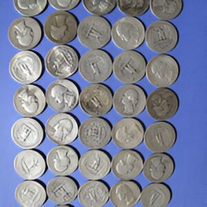 Ancient coins on blue background
